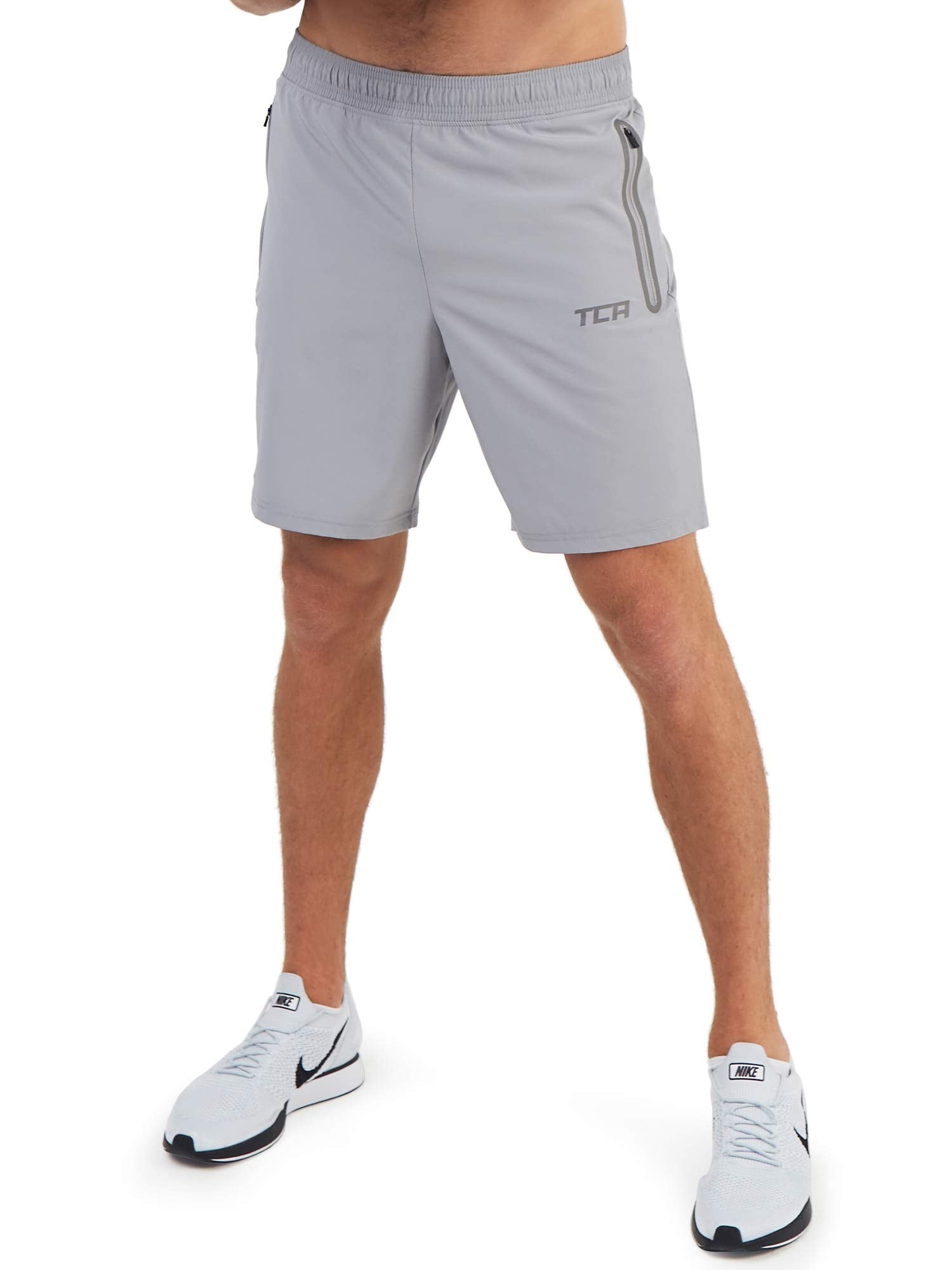 TCA Short Homme Sport - Short Running Homme Léger Elite Tech - Short Sport Homme avec Poches Zippées