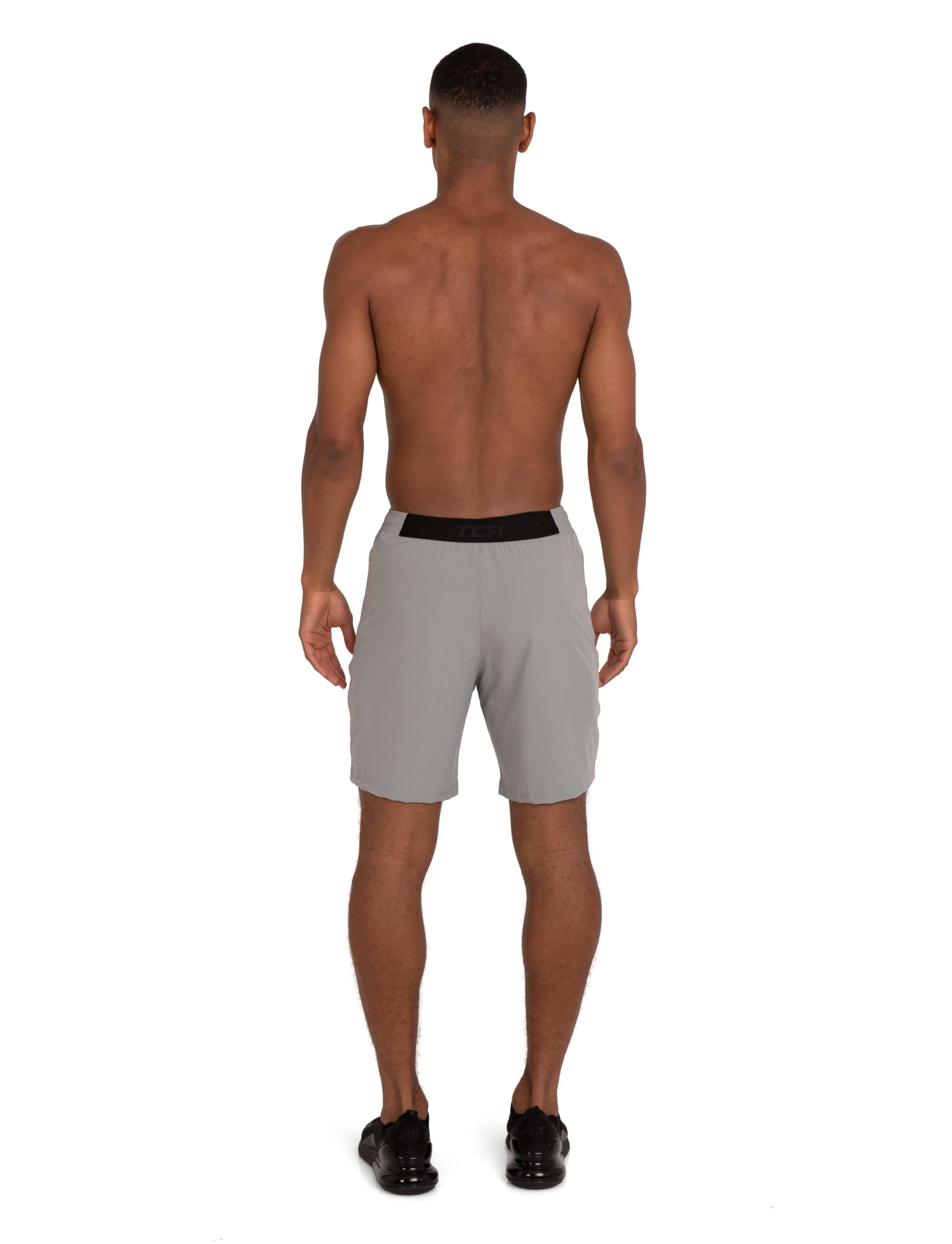 TCA Short Homme Sport - Short Running Homme Léger Elite Tech - Short Sport Homme avec Poches Zippées