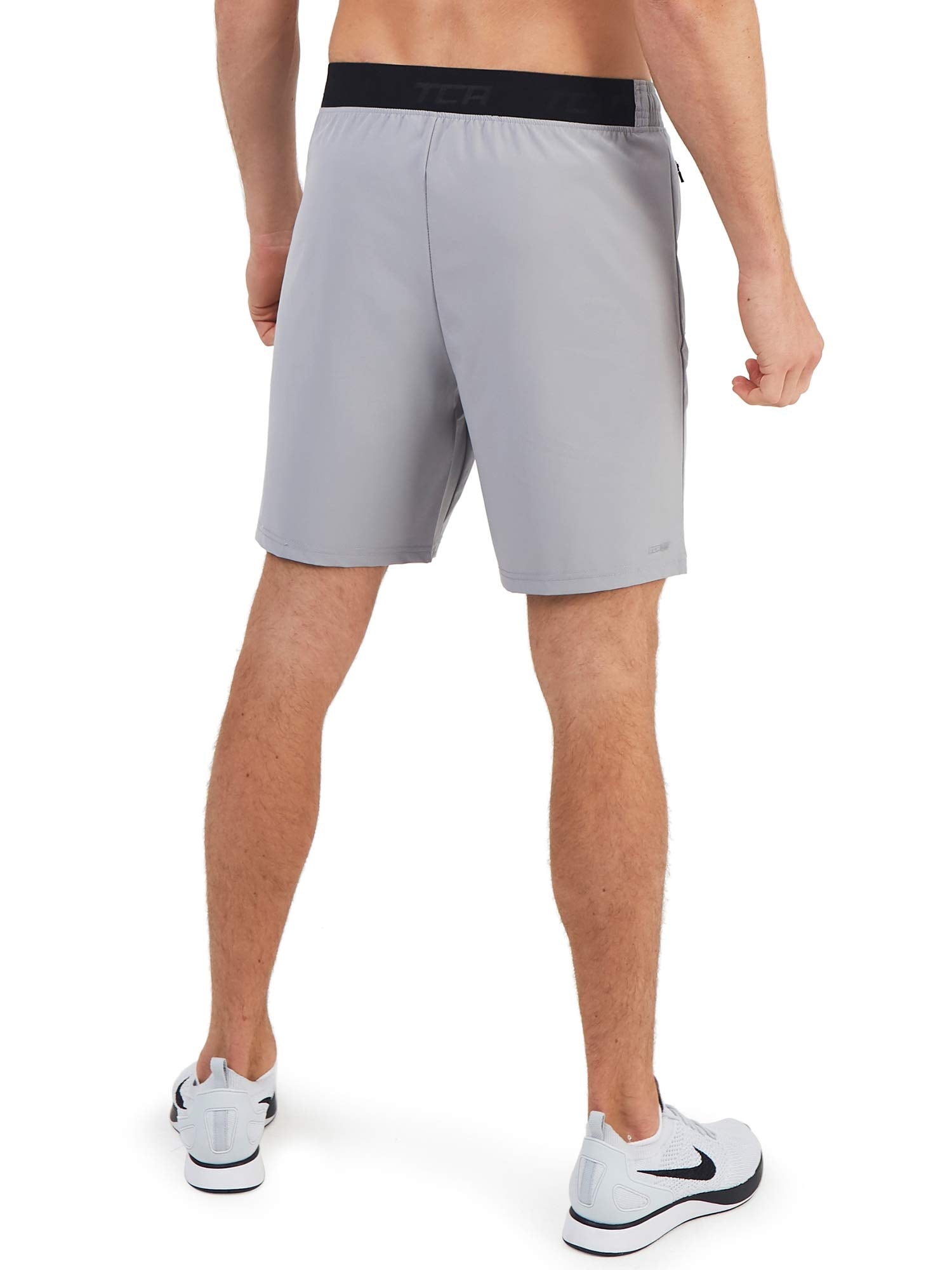 TCA Short Homme Sport - Short Running Homme Léger Elite Tech - Short Sport Homme avec Poches Zippées