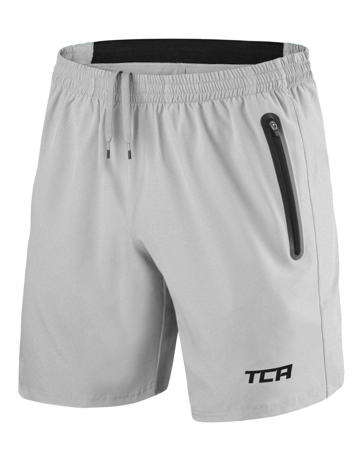 TCA Short Homme Sport - Short Running Homme Léger Elite Tech - Short Sport Homme avec Poches Zippées